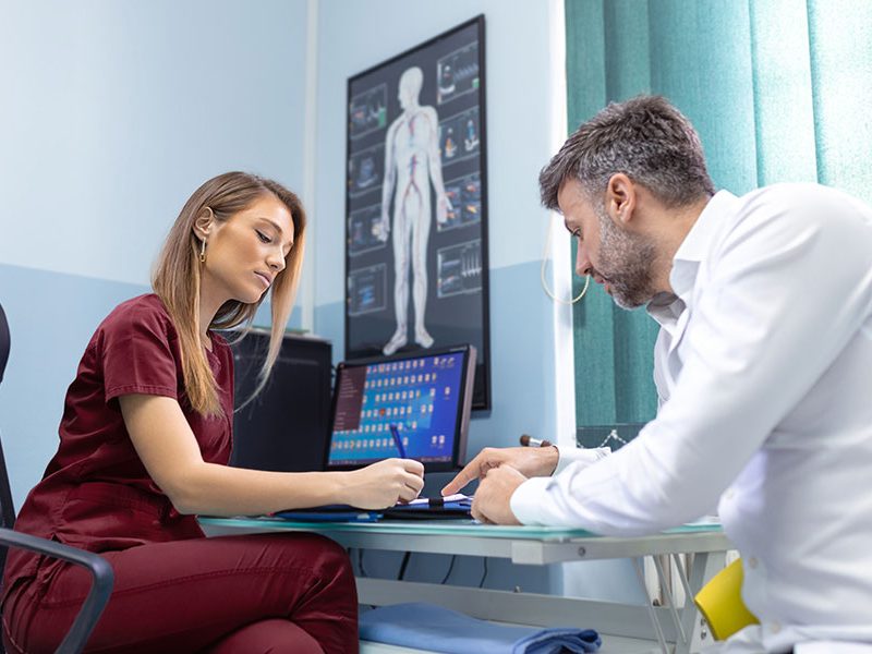 Patient receiving confidential sexual health advice during a private consultation at Glasgow Medical Rooms.